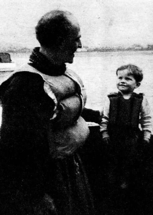 A man and a small boy in lifejackets