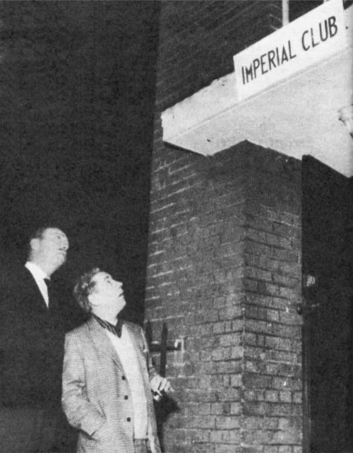 Two men outside the Imperial Club