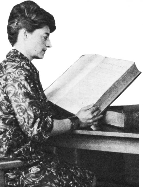 Patricia Owtram with a large book